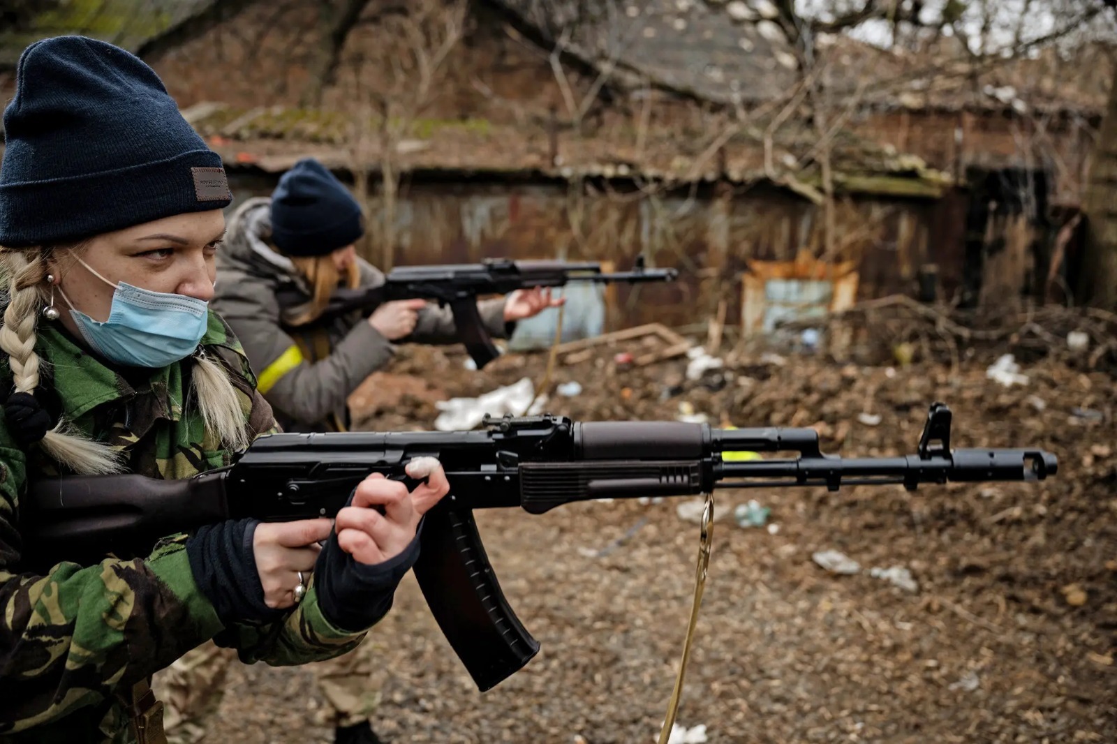 Female Ukrainian volunteer fighters received weapons training in Kyiv as they prepare to confront the Russian forces near the city. - The New York Times