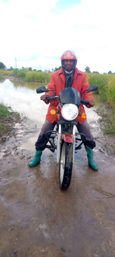 Bro. Isaac traveling by motorbike in Morogoro.